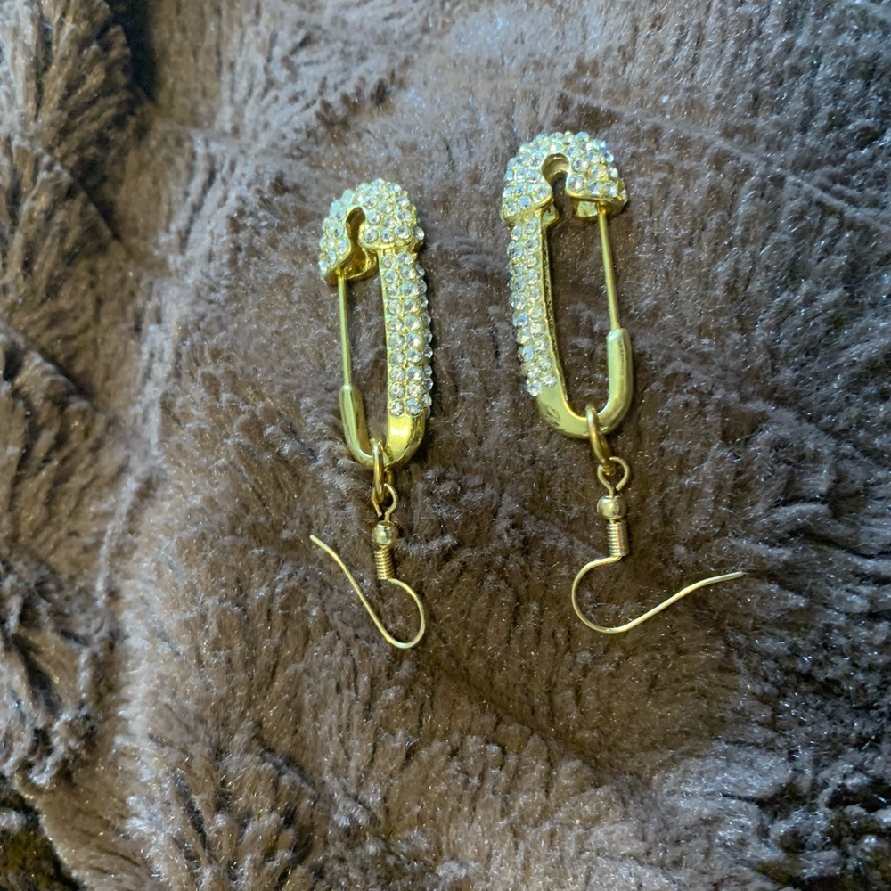 Ms Youniverse earrings made from 2 pins from the bracelet